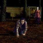 Liv Tyler attemptes to escape from one of the interlopers in The Strangers.